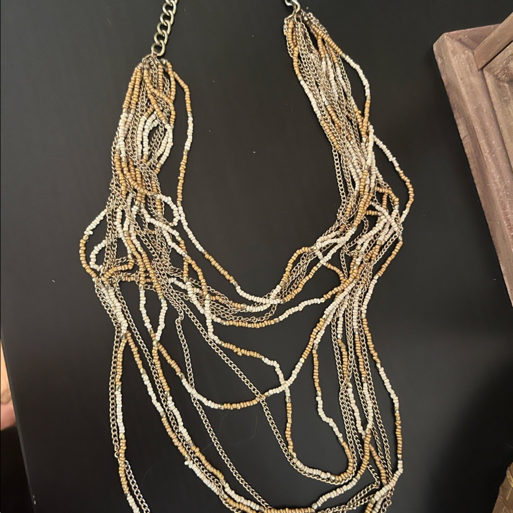 Beige and white multi level beaded necklace